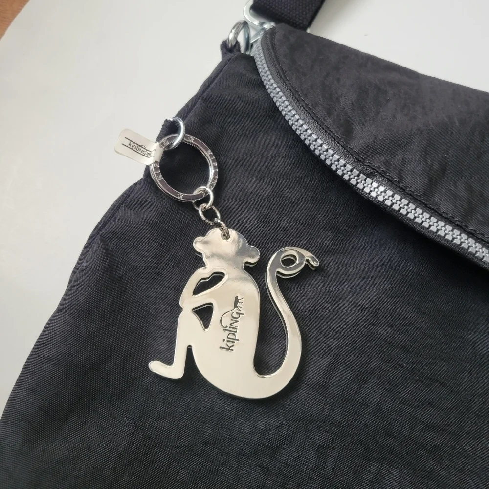 Kipling DIGISLING TM 4887. Crossbody Messenger bag.